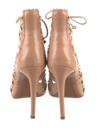 Alaïa Leather Cutout Accent Lace-Up Boots