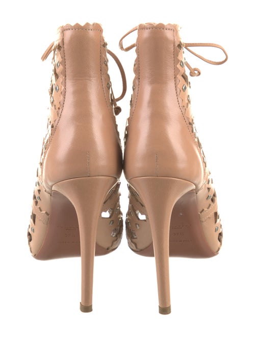 Alaïa Leather Cutout Accent Lace-Up Boots