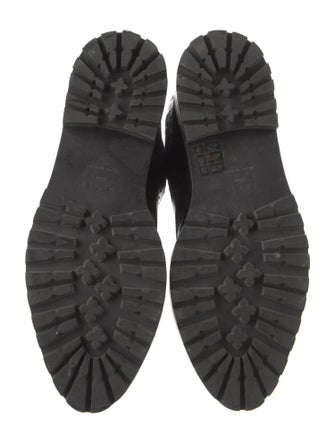 Alaïa Leather Lasercut Accents Combat Boots