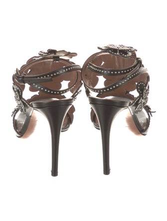 Alaïa Leather Studded Accents T-Strap Sandals