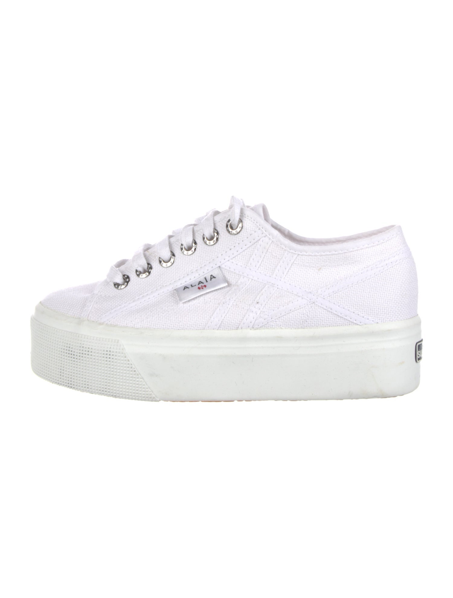 Alaïa Leather Cutout Accent Sneakers