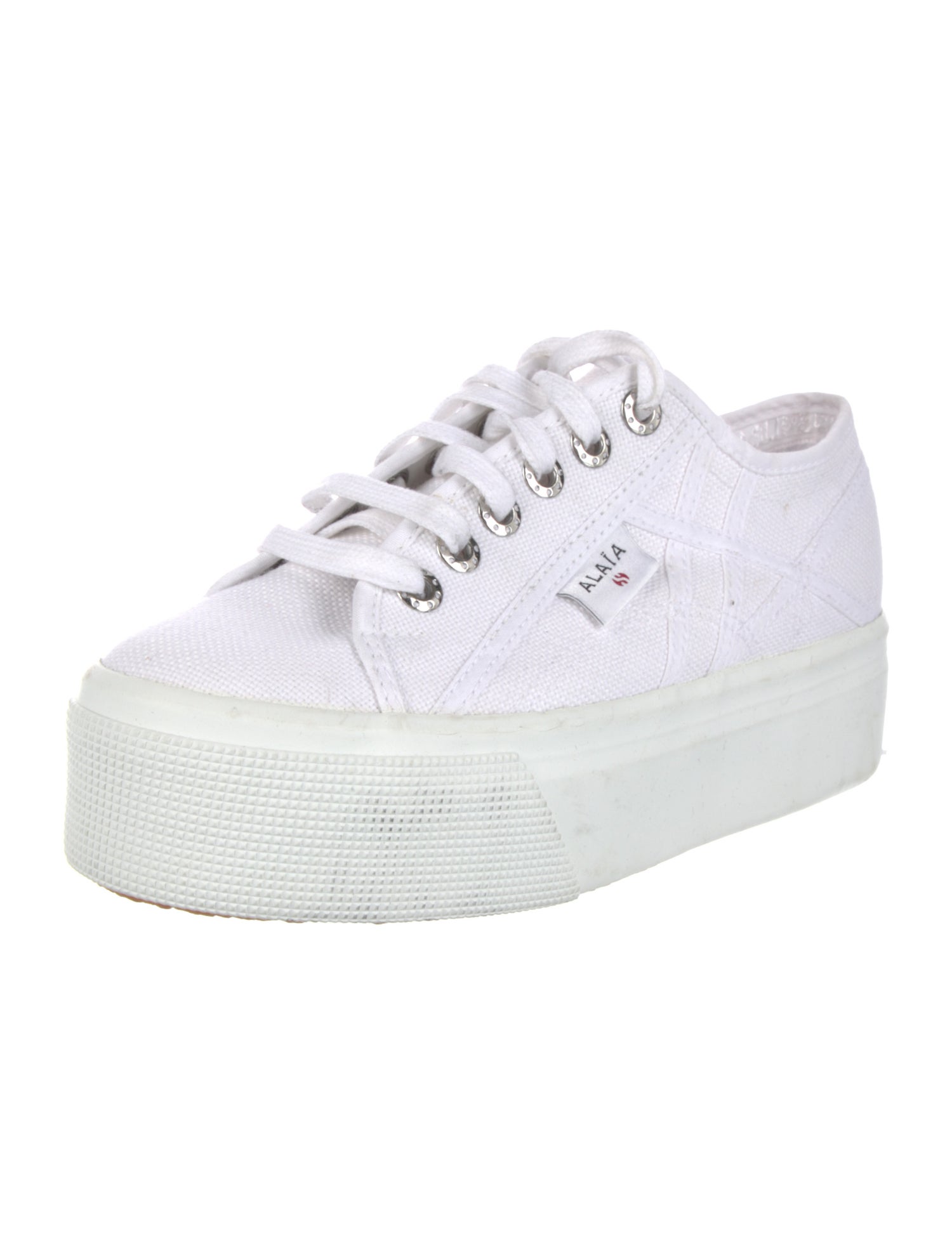 Alaïa Leather Cutout Accent Sneakers