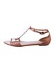 Alaïa Leather Lasercut Accents T-Strap Sandals