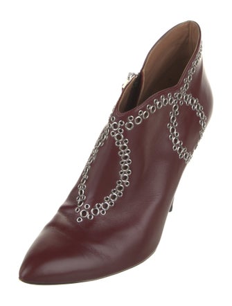 Alaïa Leather Studded Accents Western Boots
