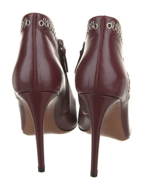 Alaïa Leather Studded Accents Western Boots