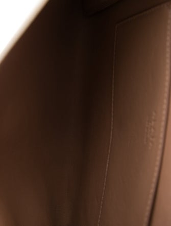 Alaïa Embossed Leather Clutch