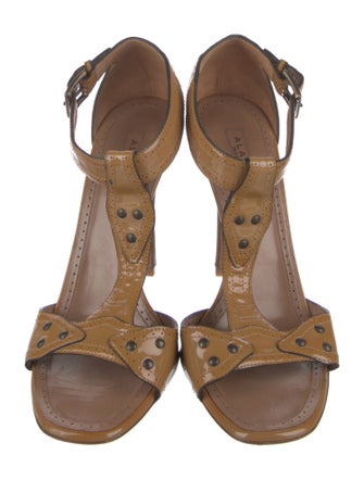 Alaïa Patent Leather T-Strap Sandals