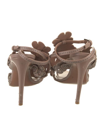 Alaïa Leather Studded Accents T-Strap Sandals