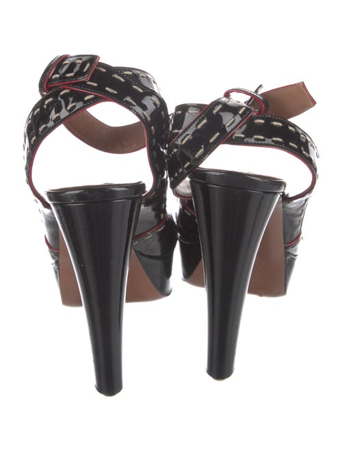 Alaïa Patent Leather Slingback Pumps