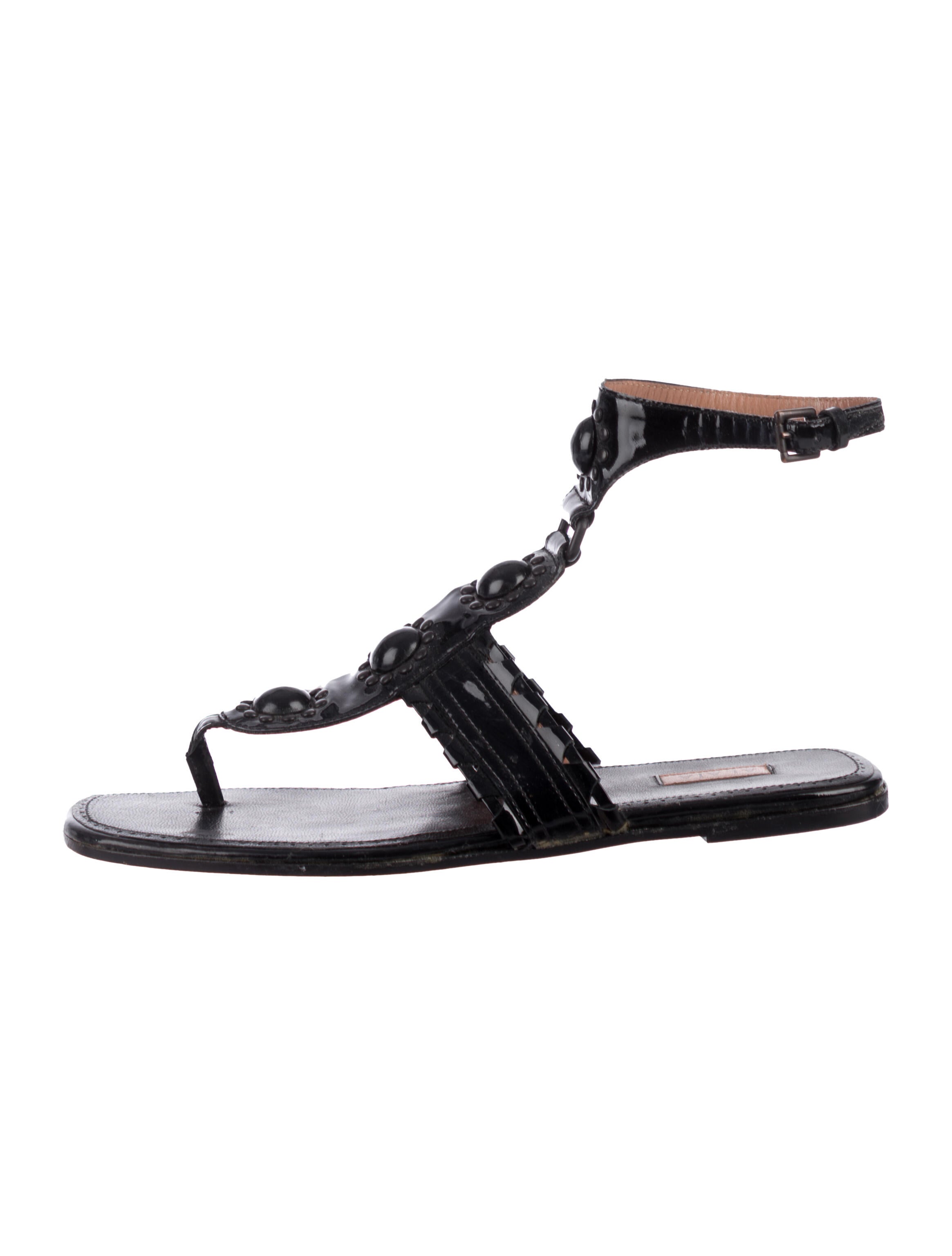 AlaÃ¯a Patent Leather Thong Embellished Sandals - Shoes - AL251565 | The RealReal