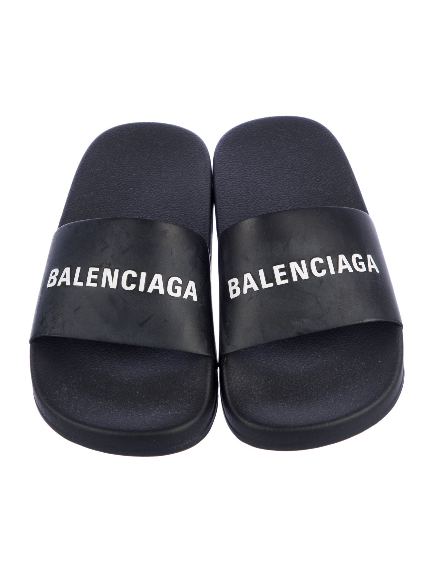 Balenciaga Black patterned slides with branding logo accent