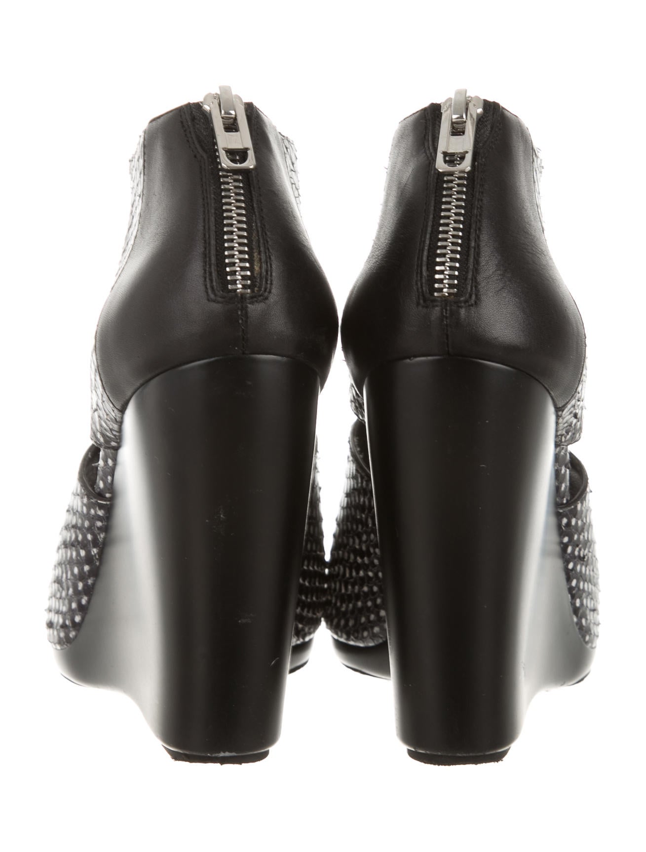 snakeskin wedge booties