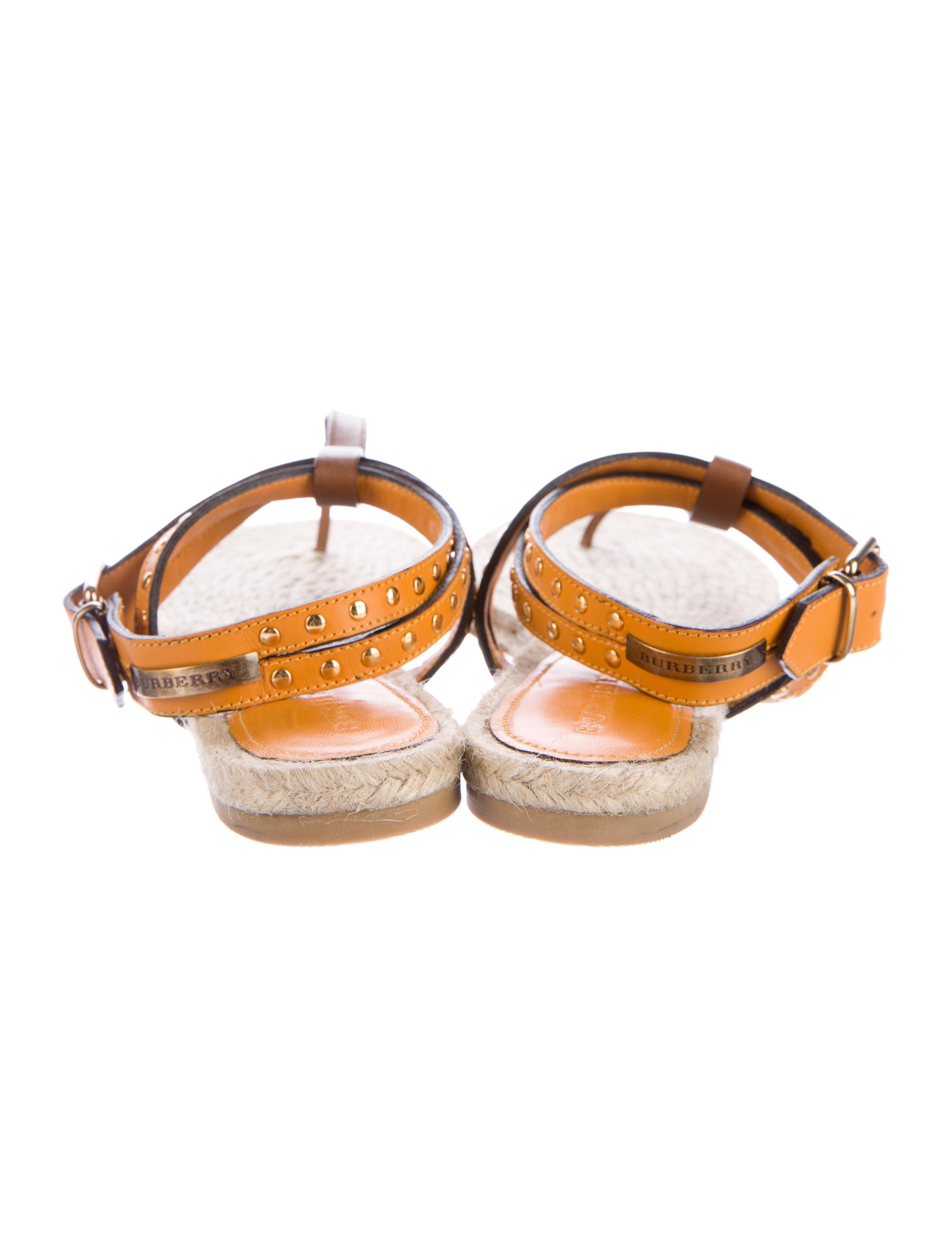 The Vajen is a flat-form espadrille sandal detailed with a studded ankle and cross strap. // # 
