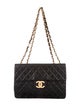 Chanel Classic Maxi Flap Bag