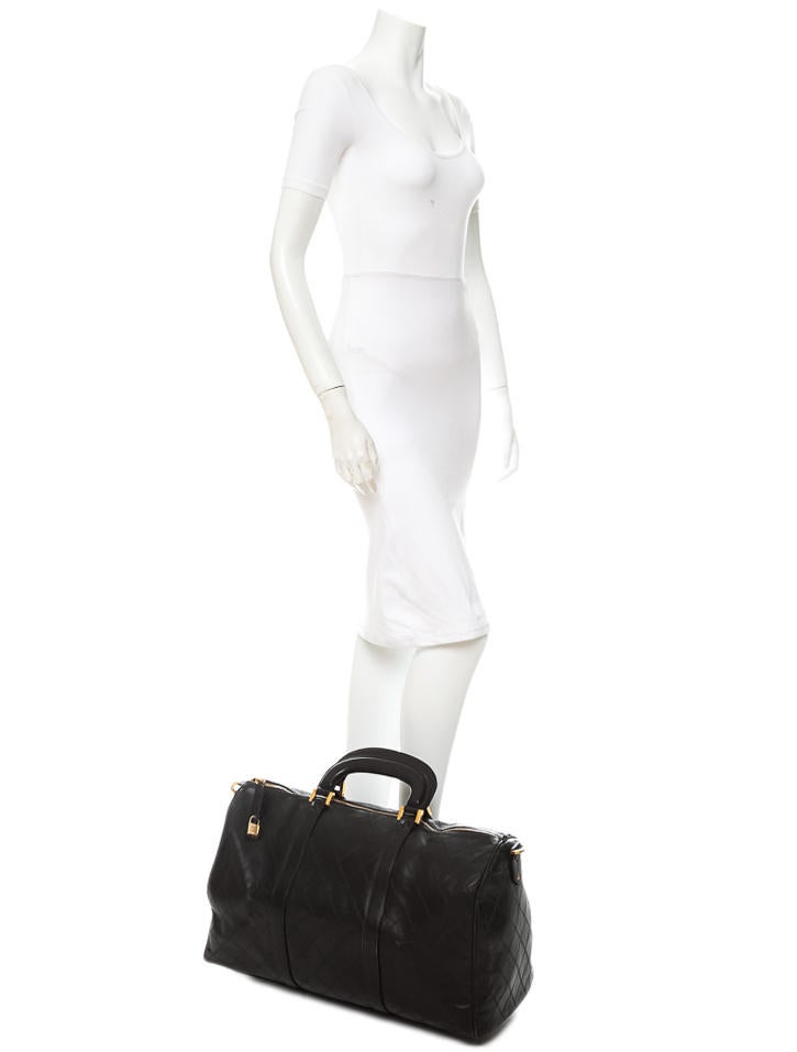 Chanel Quilted Duffle Bag Handbags CHA11404 The RealReal