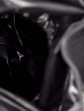 Chanel Drawstring Sling Backpack