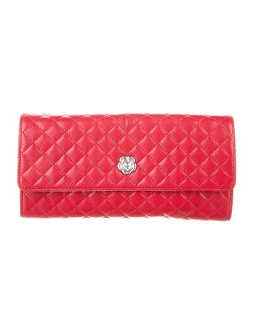 Chanel Travel Quilted Camellia Jewelry Roll Case