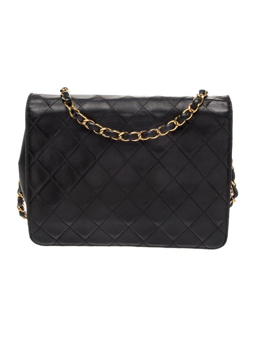 Chanel Quilted CC Flap Bag