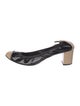 Chanel Interlocking CC Logo Patent Leather Slingback Pumps
