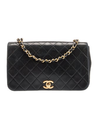 Chanel Quilted CC Flap Bag