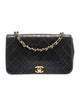 Chanel Quilted CC Flap Bag