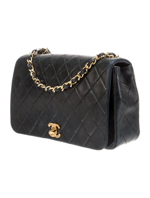 Chanel Quilted CC Flap Bag