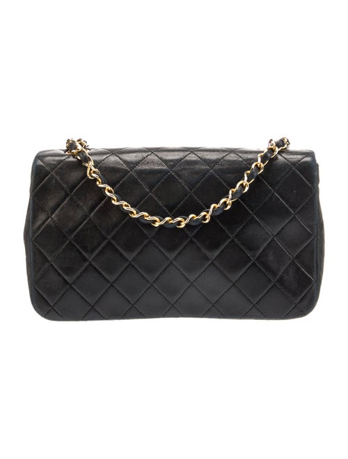 Chanel Quilted CC Flap Bag