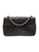 Chanel Quilted CC Flap Bag