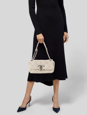 Chanel Quilted CC Flap Bag