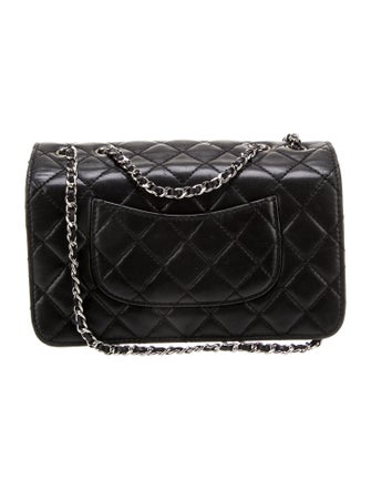 Chanel Small Clams Flap Bag