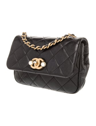 Chanel Quilted Pearl Flap Bag