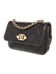 Chanel Quilted Pearl Flap Bag