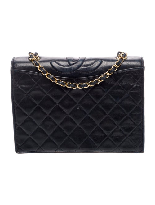 Chanel Quilted CC Flap Bag