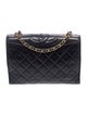 Chanel Quilted CC Flap Bag
