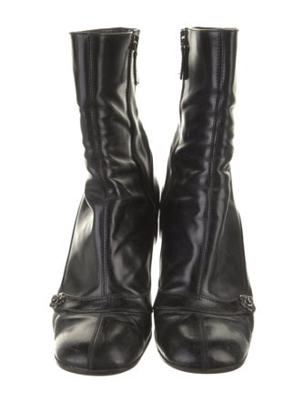 Chanel Camellia Accent Leather Boots