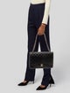 Chanel Maxi Classic Double Flap Bag