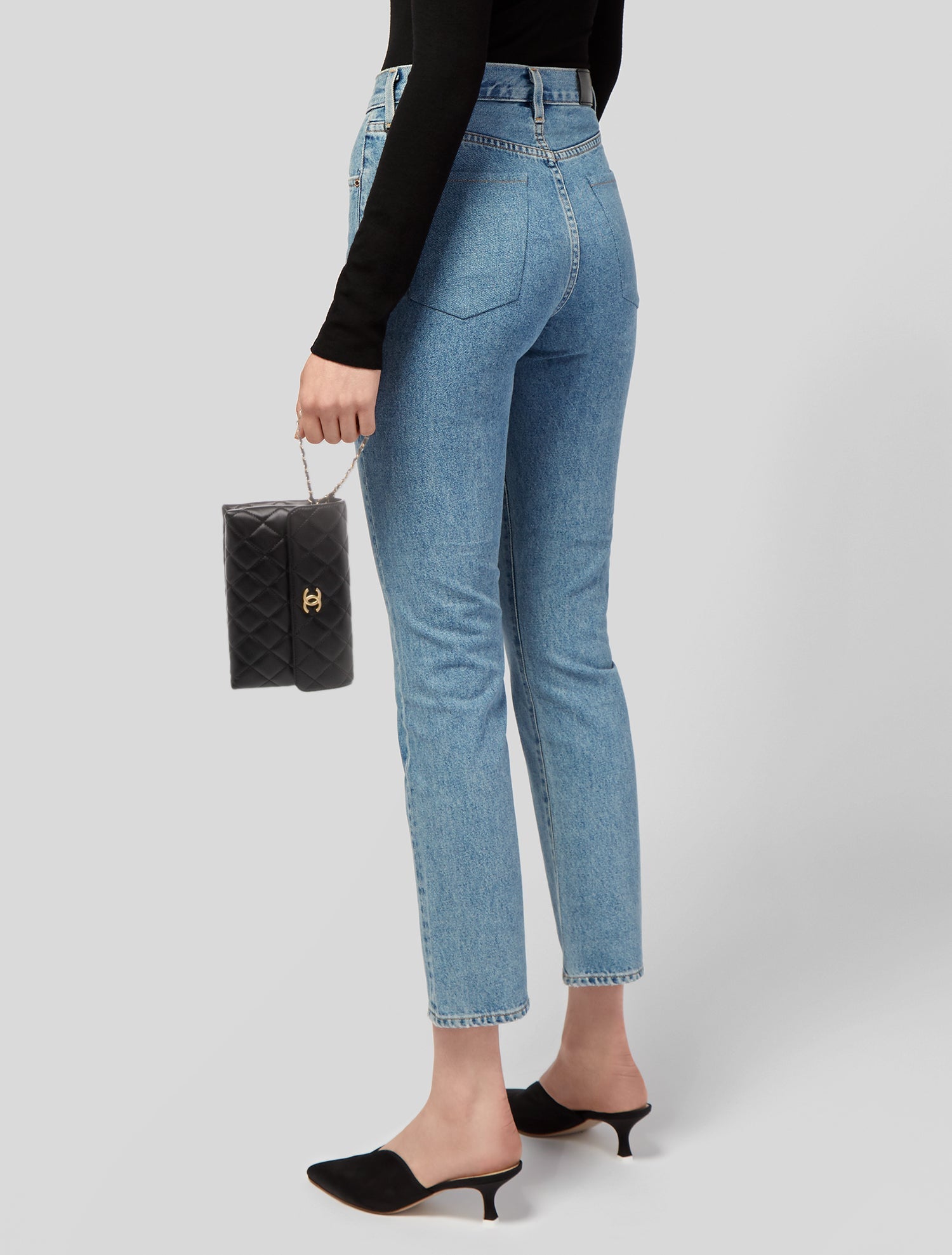 Chanel Quilted CC Lion Clutch