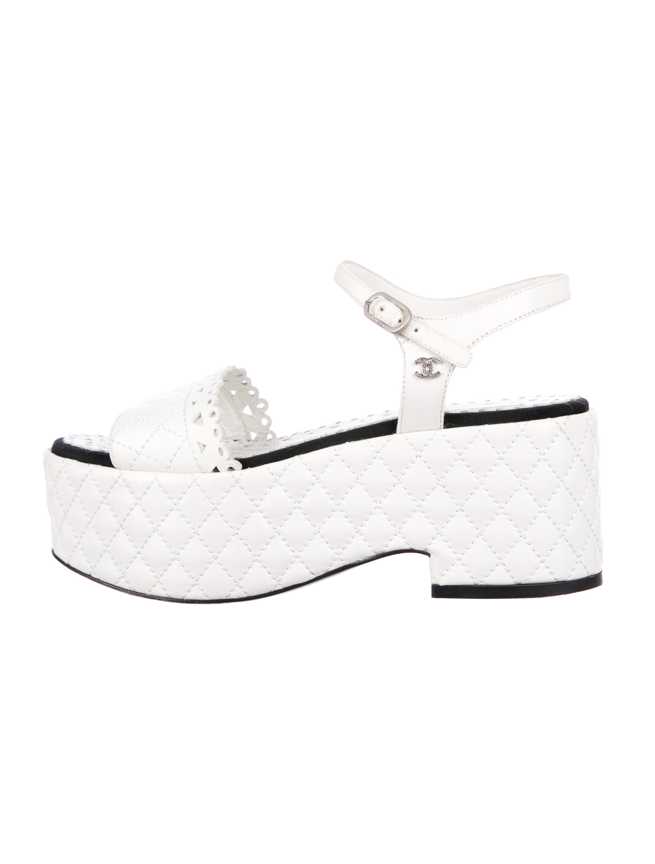 white quilted platform sandals