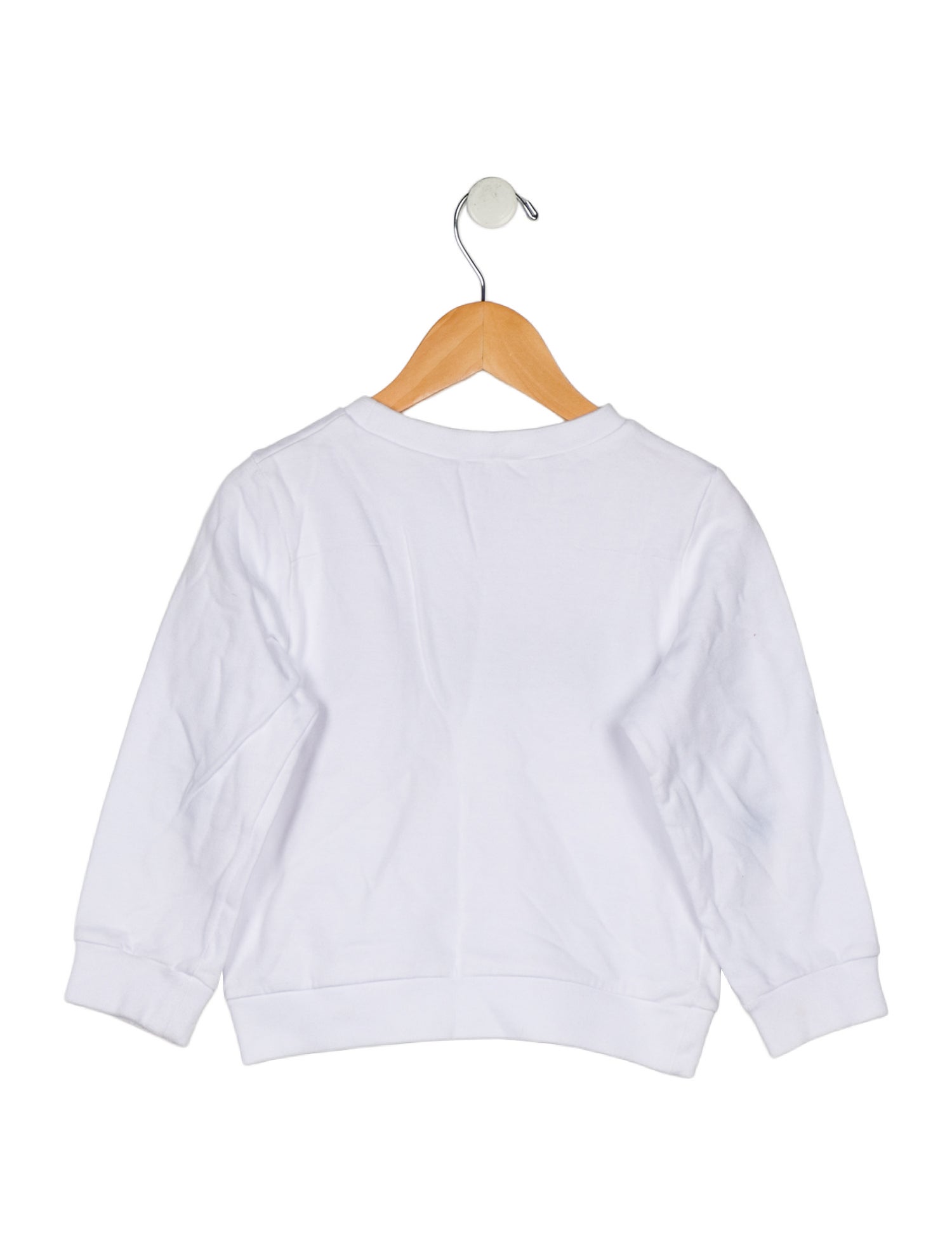 Christian Dior girls' white pullover with sewn patches.