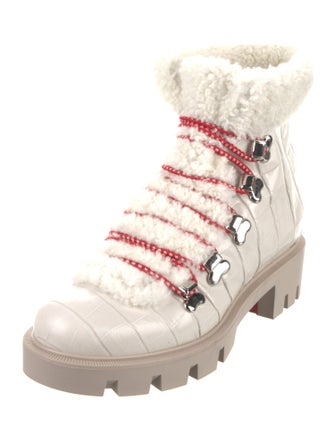 Christian Louboutin Embossed Leather Printed Combat Boots