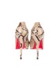 Christian Louboutin Python Platform Pumps