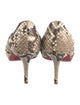 Christian Louboutin Snakeskin Animal Print Pumps