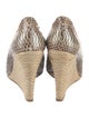 Christian Louboutin Snakeskin Animal Print Pumps