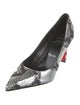 Christian Louboutin Embossed Leather Animal Print Pumps