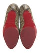 Christian Louboutin Snakeskin Animal Print Pumps