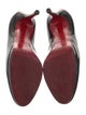 Christian Louboutin Patent Leather Pumps