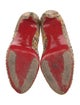 Christian Louboutin Snakeskin Animal Print Pumps