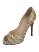 Christian Louboutin Snakeskin Animal Print Pumps