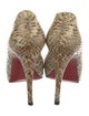 Christian Louboutin Snakeskin Animal Print Pumps