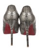 Christian Louboutin Leather Pumps